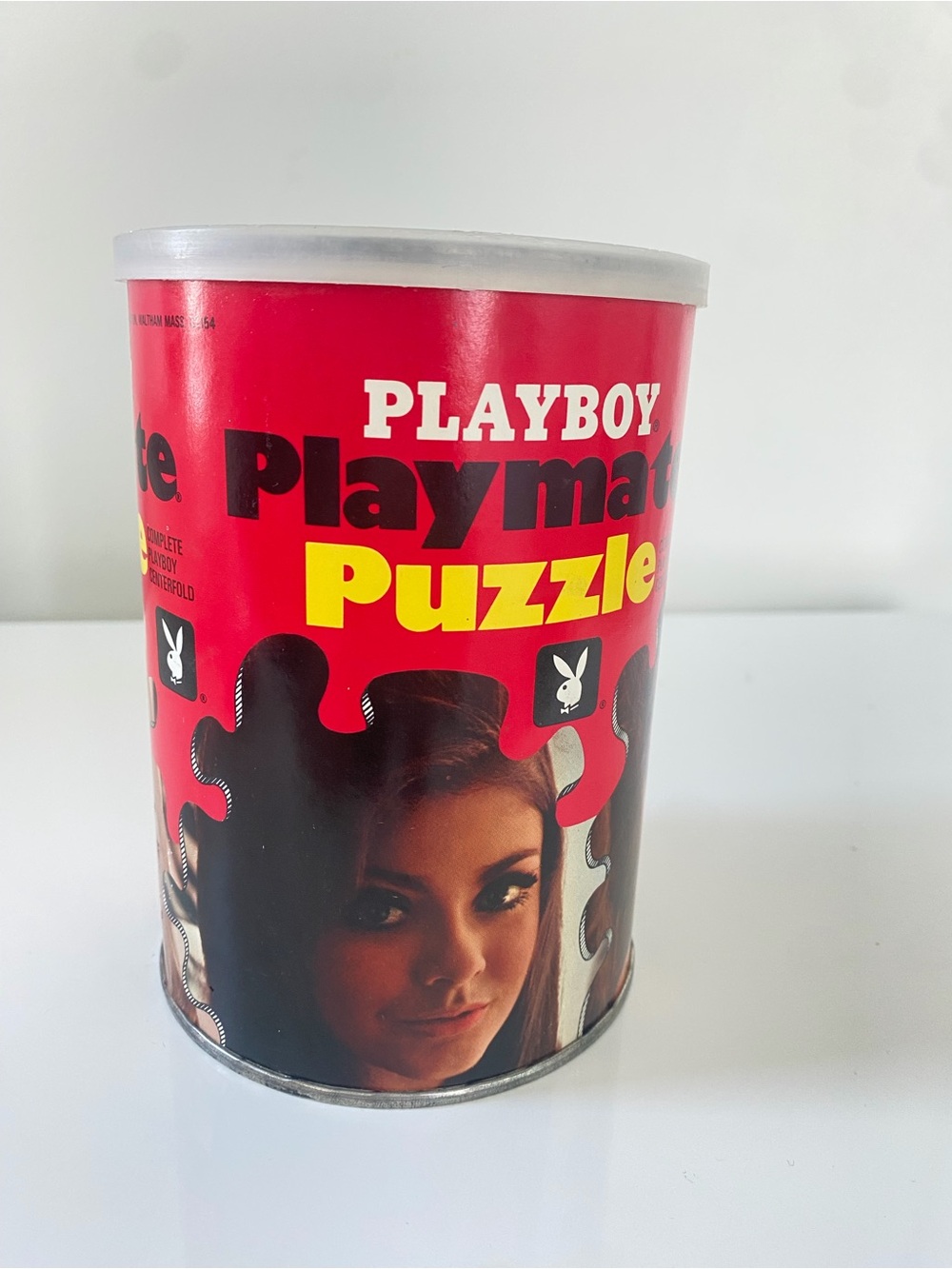 Rare Vintage unopened Playboy puzzle sealed in a can.